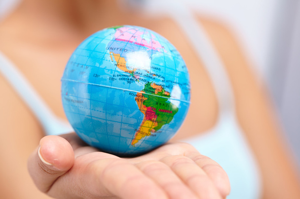 earth globe in woman's palm - Photo, Image