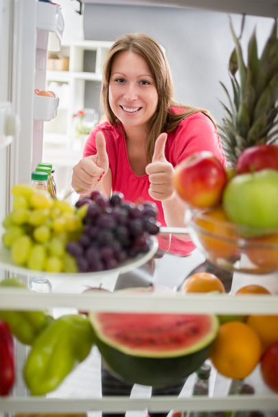 Woman show thumb up for healthy food - Foto, imagen