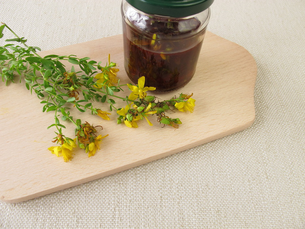 Maceration from St. John's wort flowers in olive oil - Photo, Image