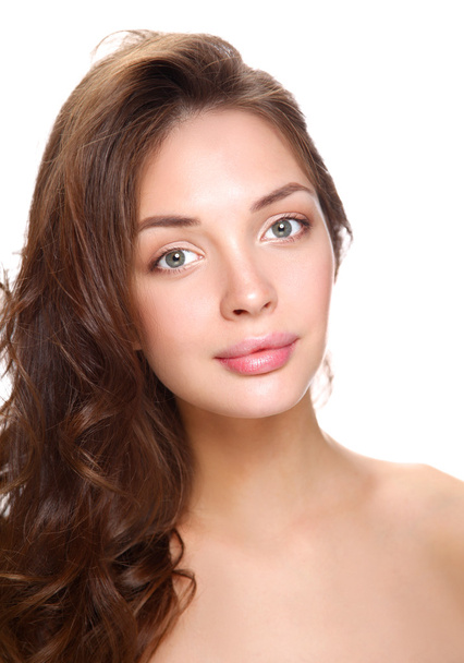 Close up portrait of beautiful young woman face. Isolated on white background. - 写真・画像