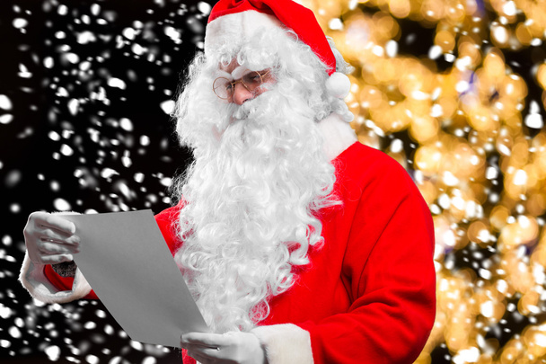 Santa Claus reading letter - Foto, imagen