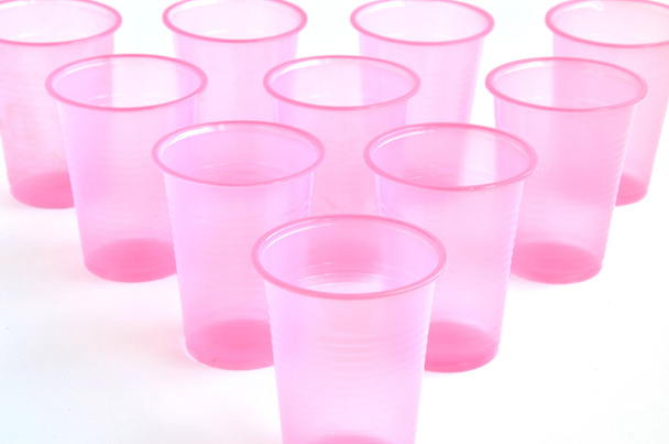 Üres rózsaszín műanyag pohár - Fotó, kép