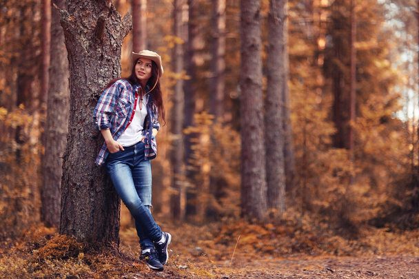 Young girl in the forest ranger - Valokuva, kuva