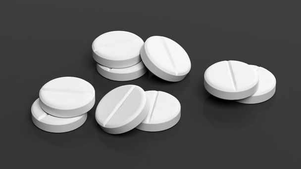 Pílulas redondas brancas, isoladas em fundo preto
. - Foto, Imagem
