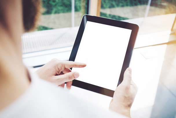 Bearded man touching the screen on his tablet - Photo, Image