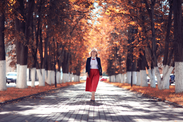 Autumn portrait of a business woman in the street - Фото, изображение