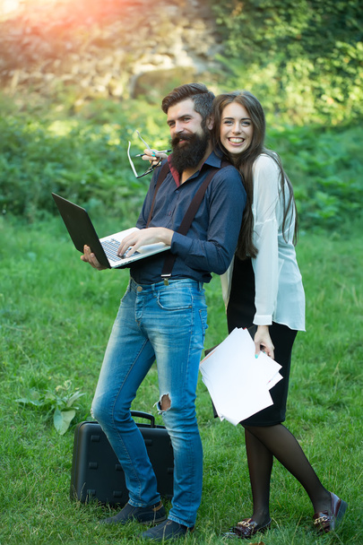 Business couple in park - Photo, image