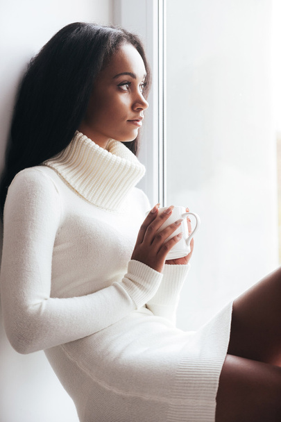 African woman in warm sweater - Photo, image