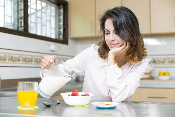 Attractive woman having breakfast - Photo, Image