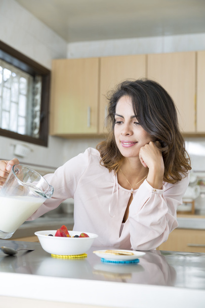 Attractive woman having breakfast - Фото, изображение