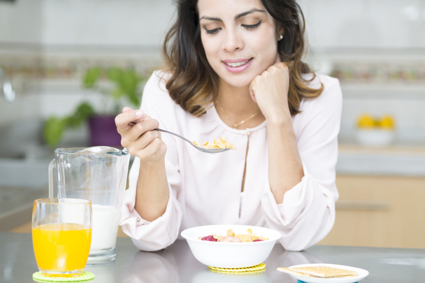 Attractive woman having breakfast - Фото, зображення