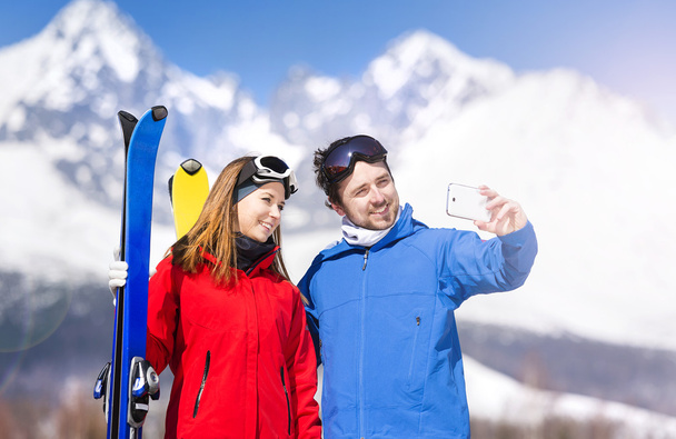 Young couple skiing - Fotó, kép