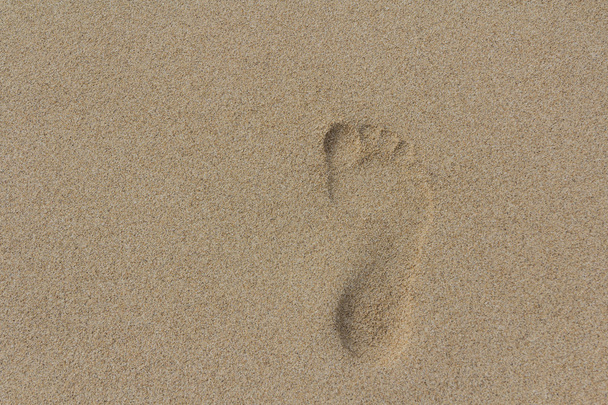Zand en voet - Foto, afbeelding