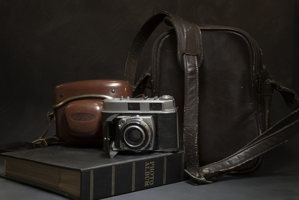 Still life of Vintage camera and bag - Fotografie, Obrázek