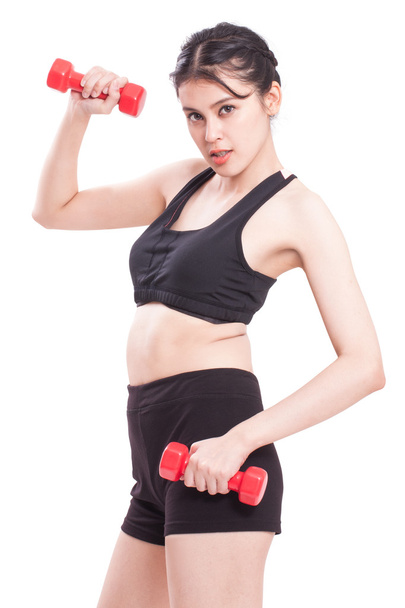 Sport woman exercising with dumbbells - Fotó, kép