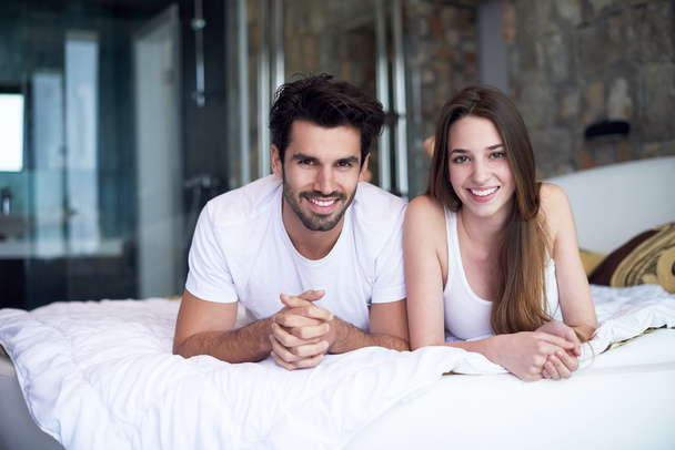couple relax and have fun in bed - Photo, Image