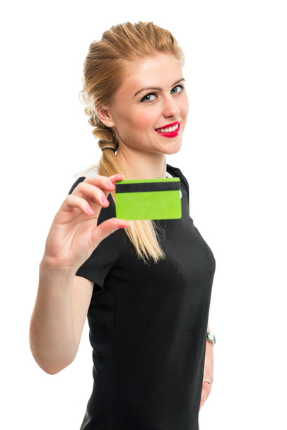 Portrait of a beautiful young smiling woman with a bank card. - Fotografie, Obrázek