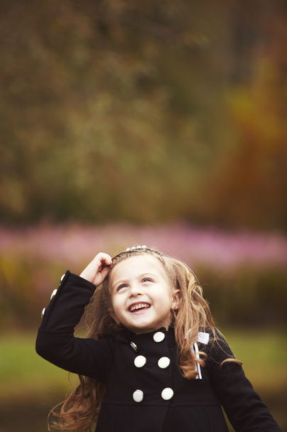Cute little girl thinking with copy space - Valokuva, kuva