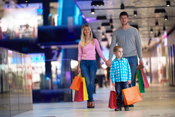 young family with shopping bags - Photo, image