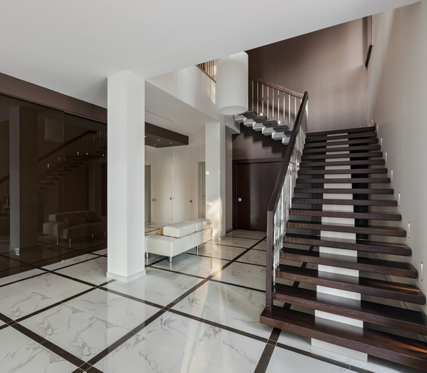 Luxury hall interior with staircase and glass wardrobe - Foto, afbeelding