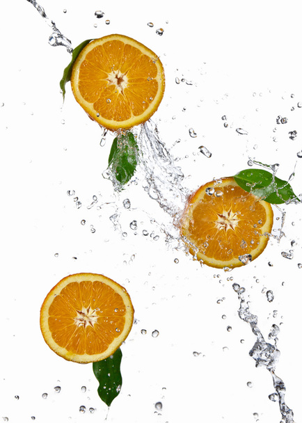 Orange juice splashing - Fotografie, Obrázek