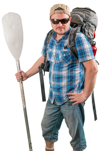 Tourist man with backpack and paddle - Zdjęcie, obraz