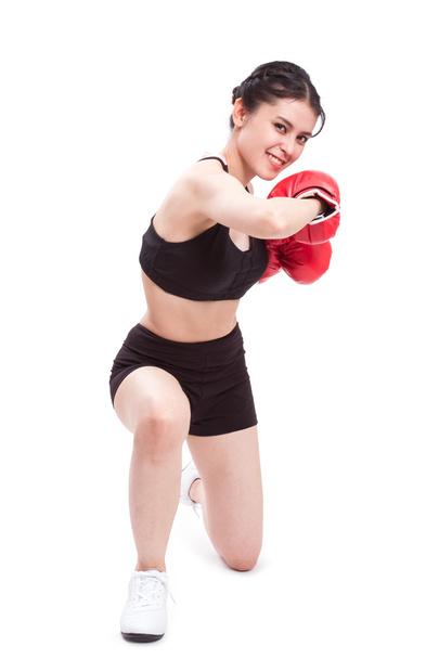 Fitness woman wearing boxing gloves - Foto, afbeelding