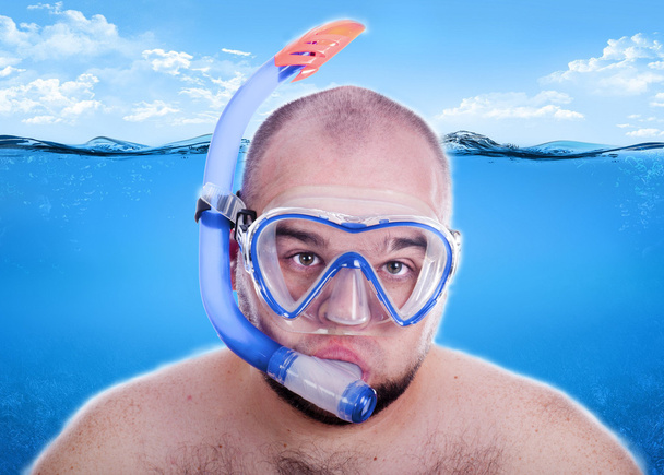 Young man in water mask - Valokuva, kuva