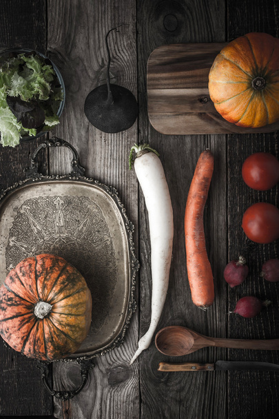 Vegetable mix with vintage tray and kitchenware with film filter effect - Фото, изображение