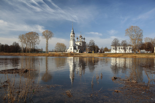 Church on river shore - Foto, Imagen