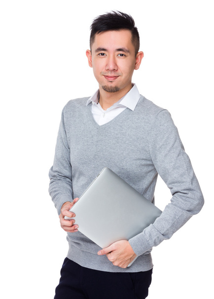 Молодий азіатський бізнесмен в сірому светрі
 - Фото, зображення