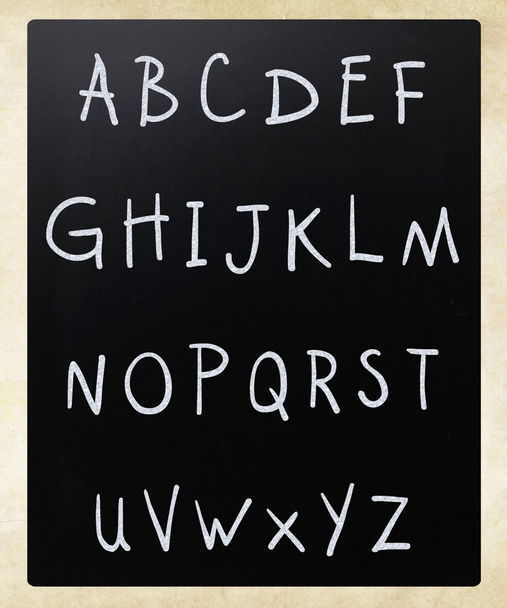Complete english alphabet handwritten with white chalk on a blac - Photo, Image