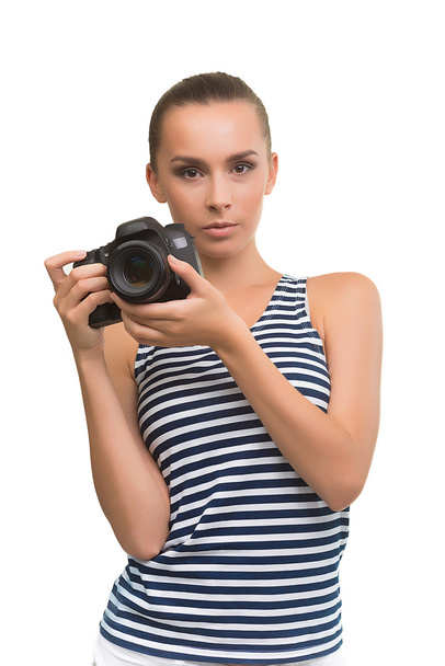 Cute girl with the camera. - Photo, image