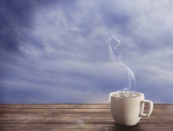 Cup of coffee on sky background - Foto, immagini
