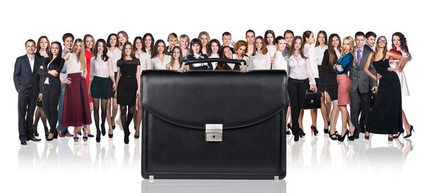 Black briefcase foreground and business peole - Photo, Image