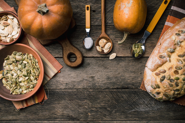 Rustic pumpkins with bread and seeds - Foto, Imagen