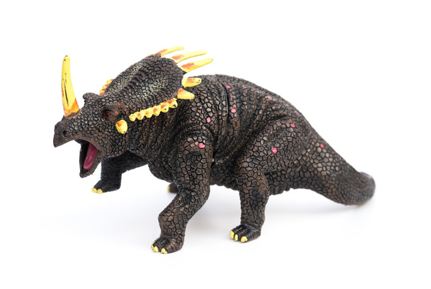 Triceratops Spielzeug auf weißem Hintergrund - Foto, Bild