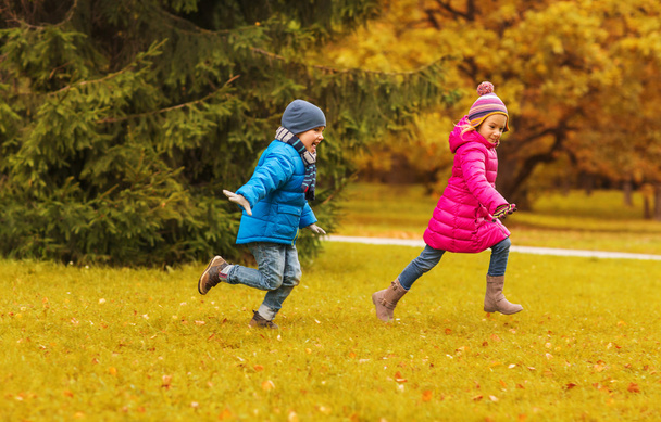 group of happy little kids running outdoors - Foto, Imagen