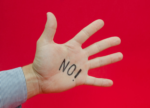 Sprechen Sie mit der Hand oder sagen Sie Nein zu etwas, das von einem Unternehmen vorgeschlagen wird - Foto, Bild