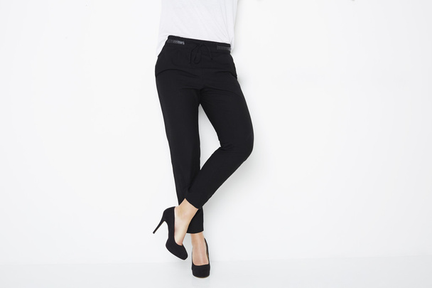Woman in black heels and trousers - Foto, Imagem