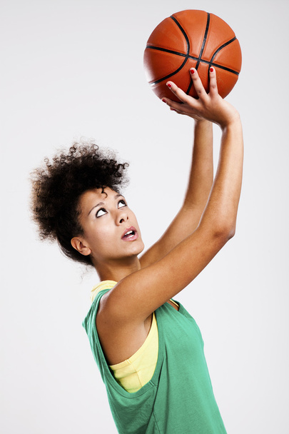 Beautiful woman with basketball - Photo, Image
