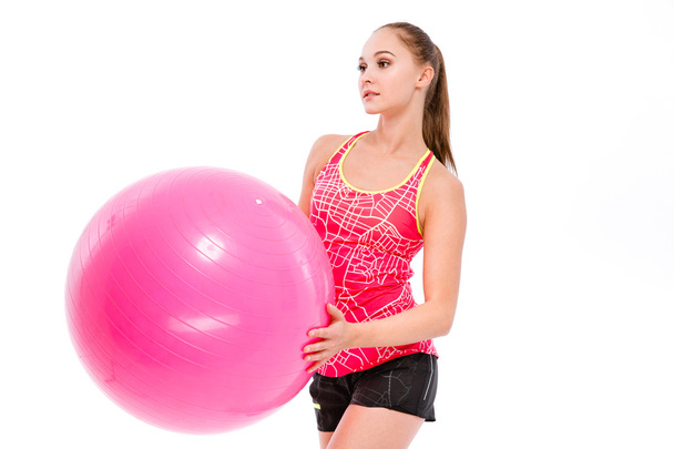 Sports woman holding fitness ball - Zdjęcie, obraz