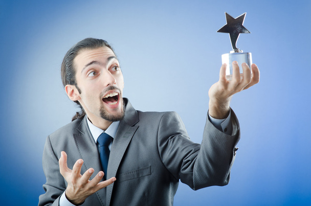 Businessman awarded with star award - Foto, immagini