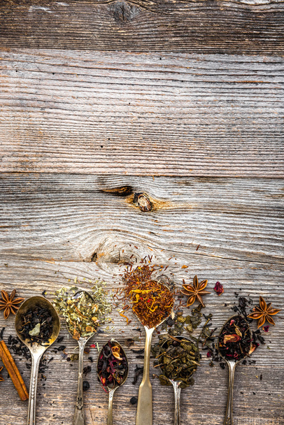 dry teas on wooden background - Foto, Imagem