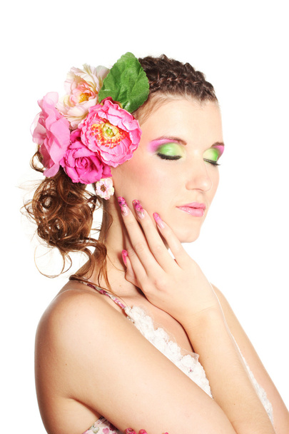 Beautiful girl with flowers in her hair isolated on white - Valokuva, kuva