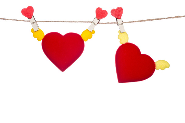 heart  shape clip on a  twine , hanging wings heart - Фото, изображение