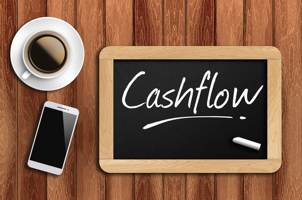 kávé, a telefon, a Palatábla a szó cash-flow - Fotó, kép