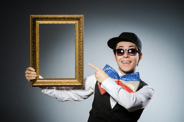 Funny man with picture frame - Foto, immagini