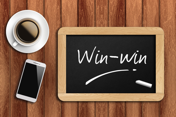 coffee, phone and chalkboard with word win
 - Фото, изображение
