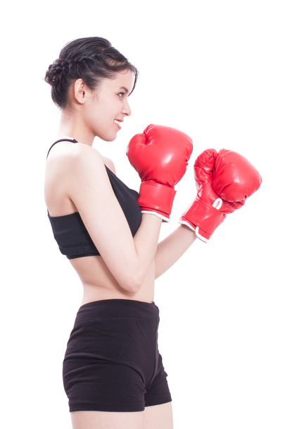 Fitness woman wearing boxing gloves - 写真・画像
